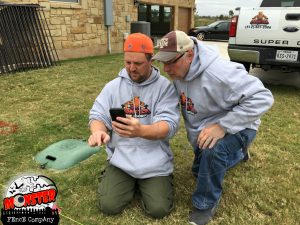 Fence Company reading blueprints before installing a post in Leander, Tx (Greatwood Subdivision)